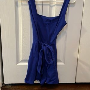 royal blue romper with gold zipper